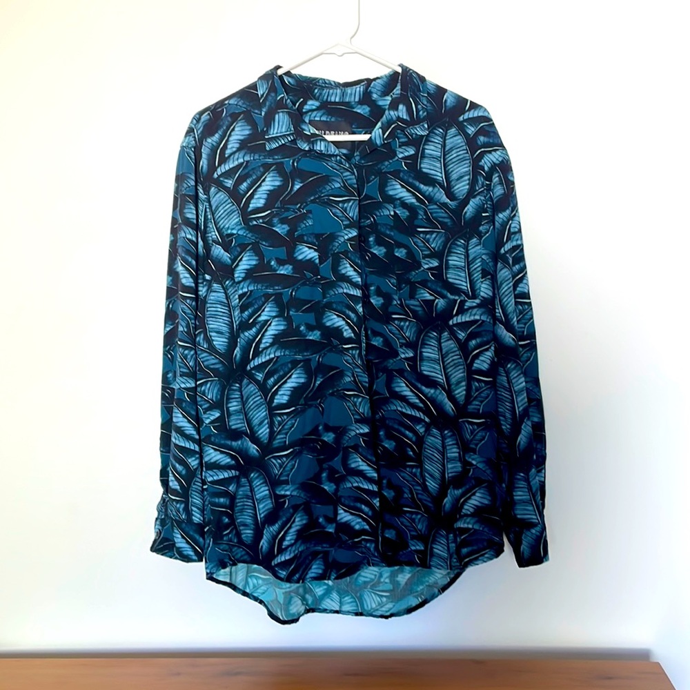 Wildfang Empower long-sleeve button up with leaf patter in blues.